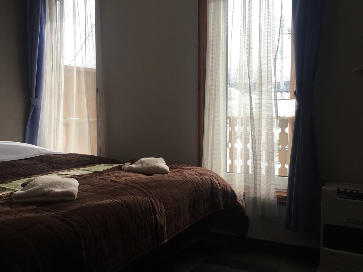Alpine Wind Bed & Breakfast Hakuba Exterior foto